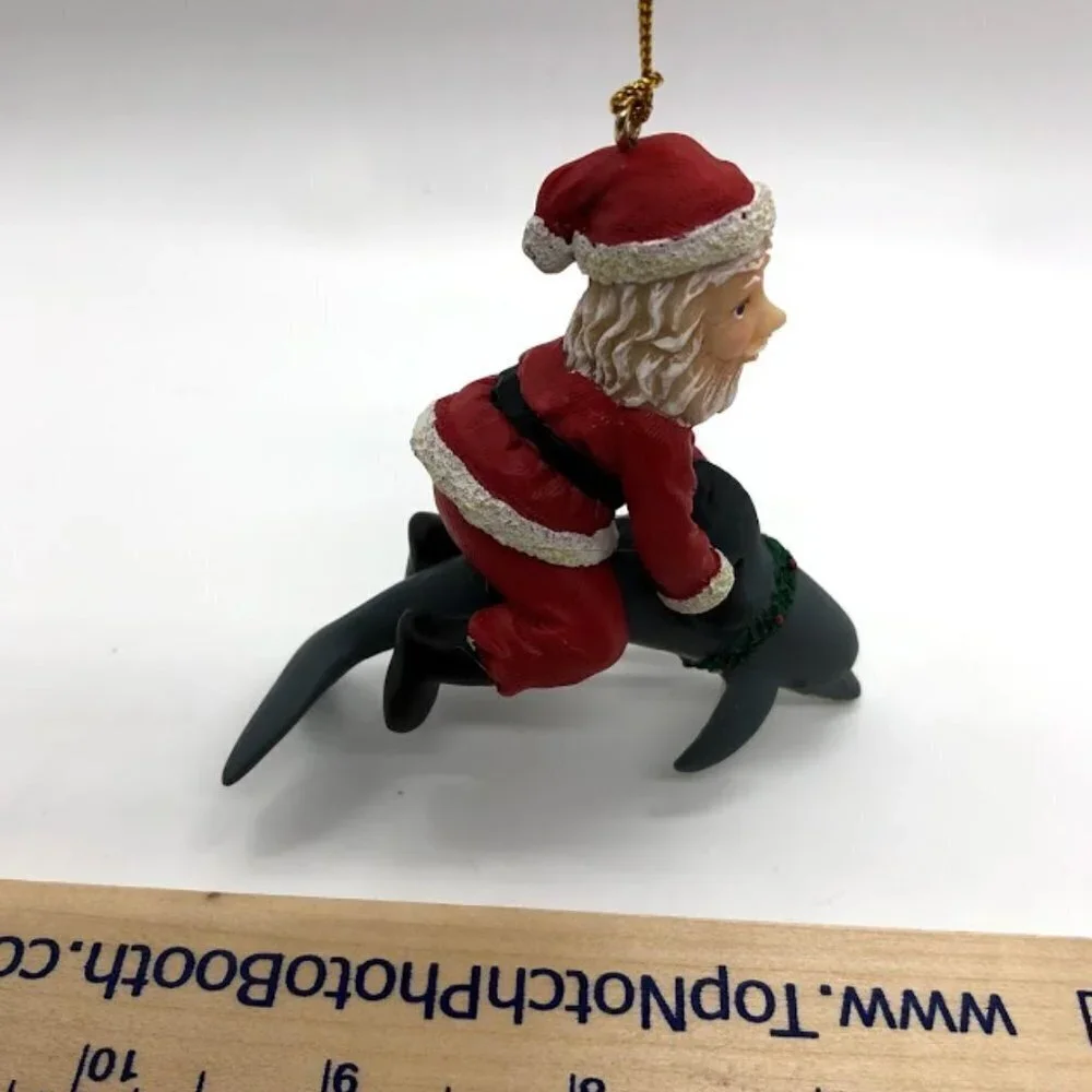 Santa Claus Riding Dolphin Ornament
